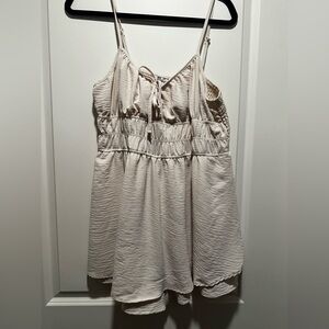 No Boundaries cream Smocked Tie Front romper dress